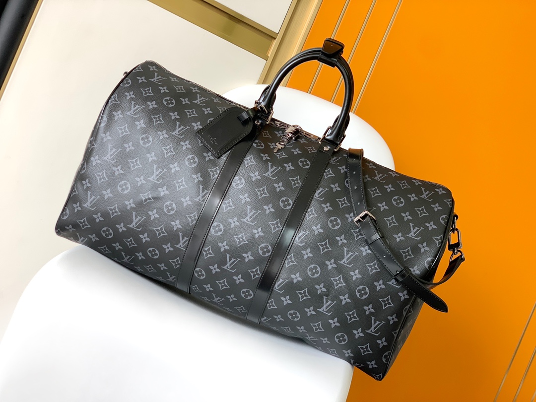 Louis Vuitton's LV latest model, a classic iconic black grey canvas travel bag, made of cut canvas