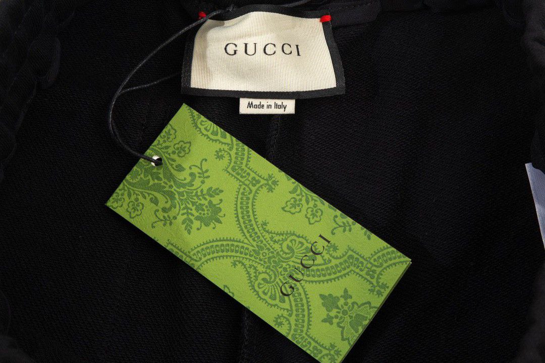 Gucci GG Embroidered Striped Color blocked Pants, with contrasting stripes on both sides of the pant legs and washed looped cotton fabric, versatile and fashionable, suitable for both men and women