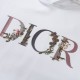 Dior's new embroidered letter patterned hoodie is available in black and white, and comes with a complete packaging box